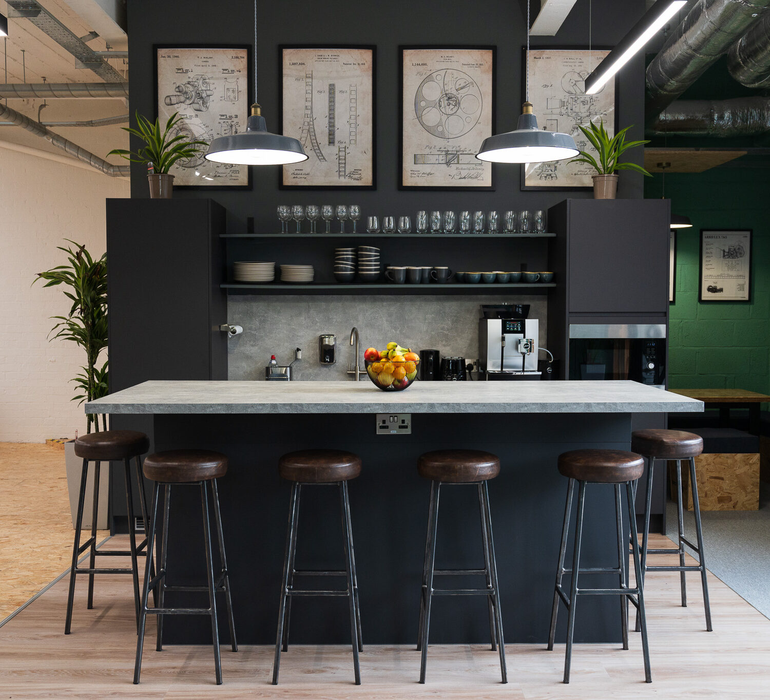 Industrial tea point with table and bar stools