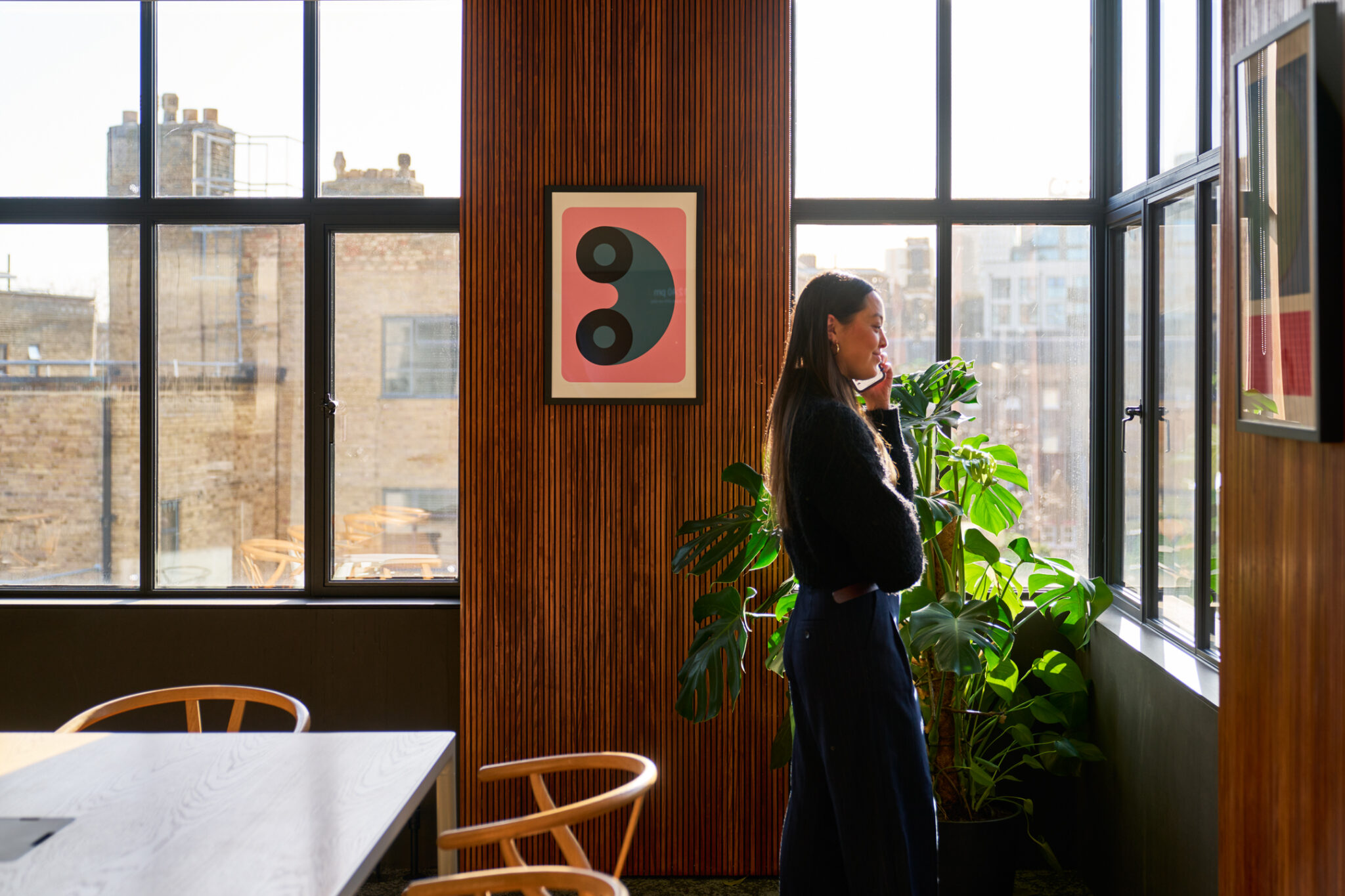 Woman on the phone in a modern office