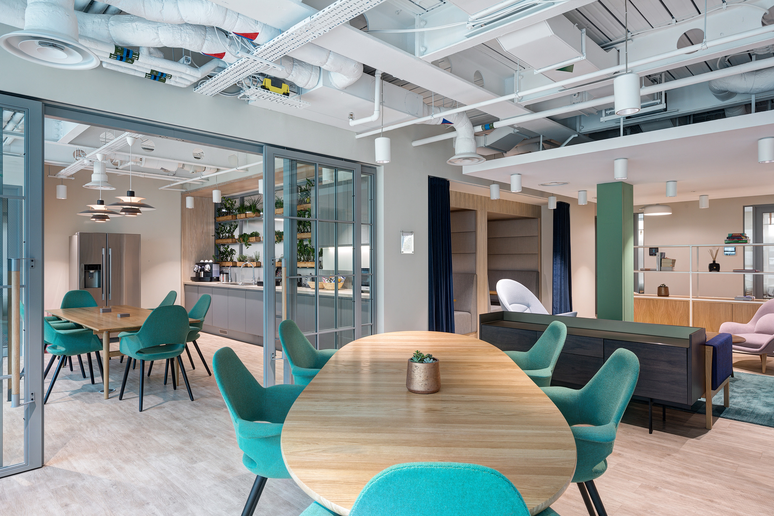 Vitruvian Workspace open-plan space featuring Vitruvian's branded colours