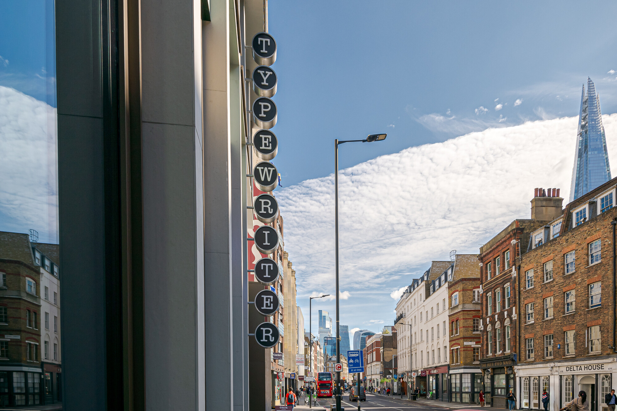 Exterior view of the Typewriter Building on Borough High Street, featuring retro-inspired signage, designed by Two for Work.Life