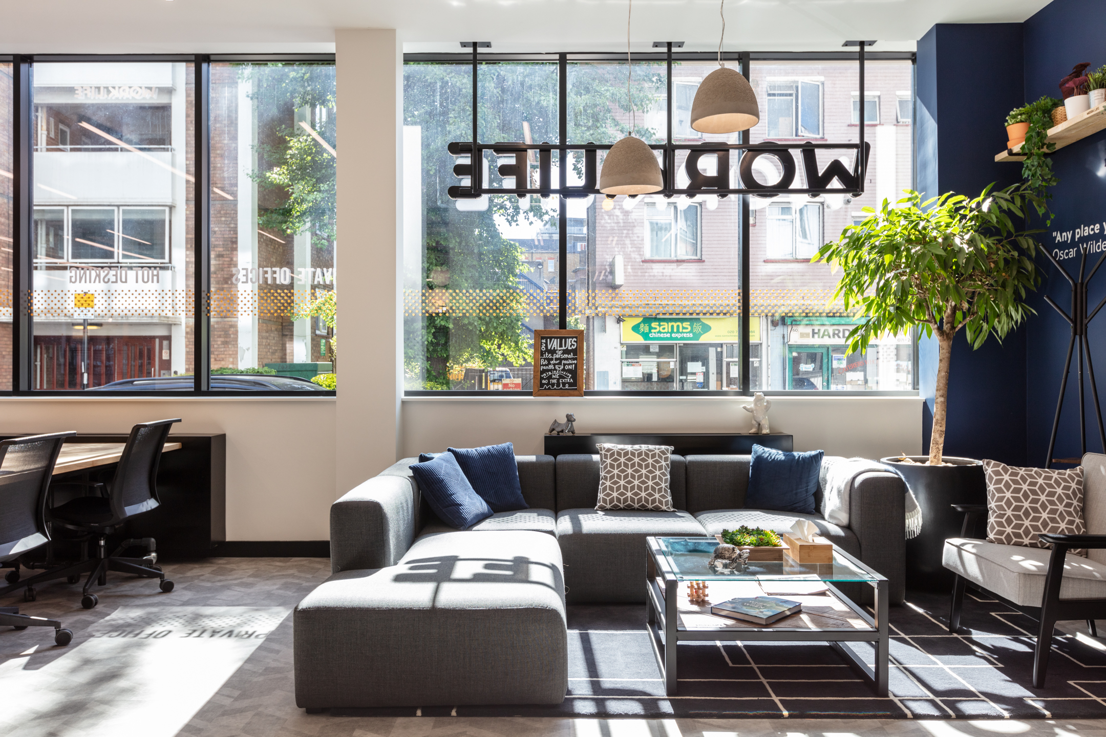 A bright lounge area in the Work.life Red Lion Street workspace, with modern sofas, large windows, and a relaxed atmosphere, carefully crafted by Two for a perfect work-life balance.