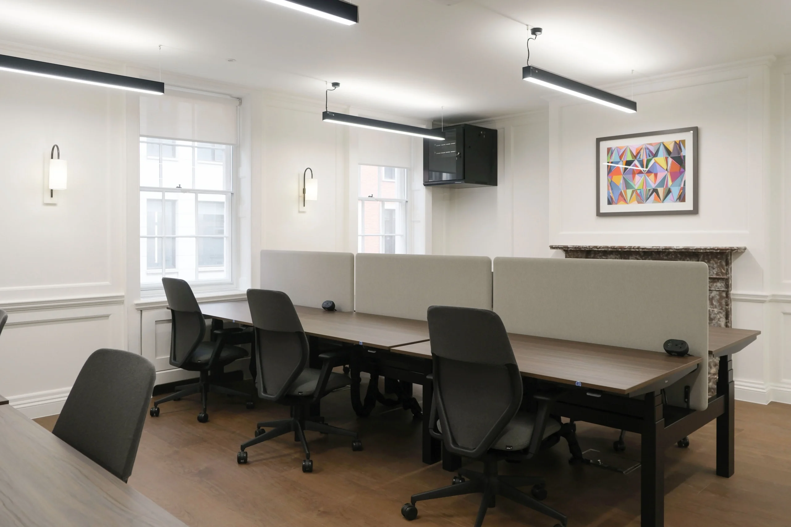 33 Mayfair open workspace with grey partitions, black office chairs, and white desking